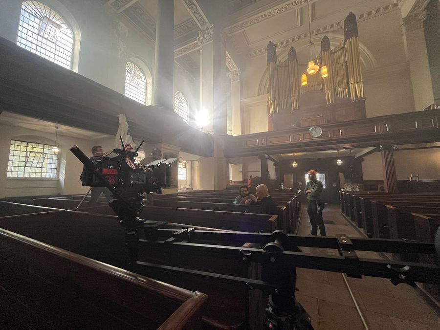 Church interior lit with haze and practicals