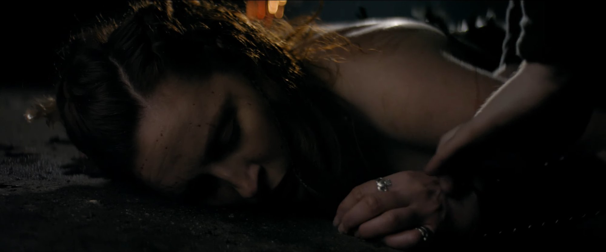Production still — candlelit night interior
